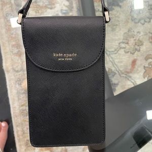 Beautiful, Black Kate Spade side bag. Adjustable straps. Fits phone and cards!
